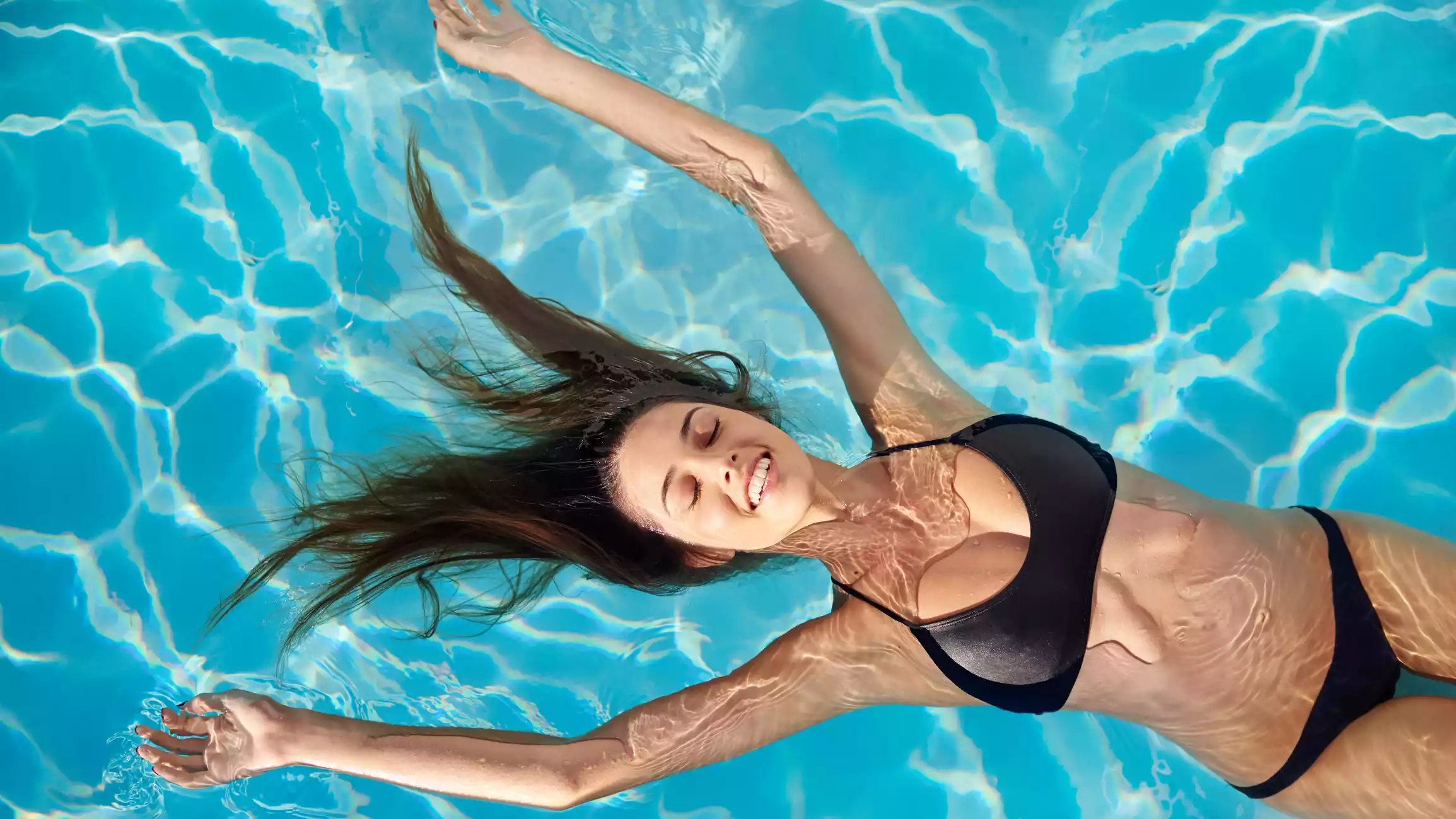 Relaxing pool swim depicting a serene outdoor activity